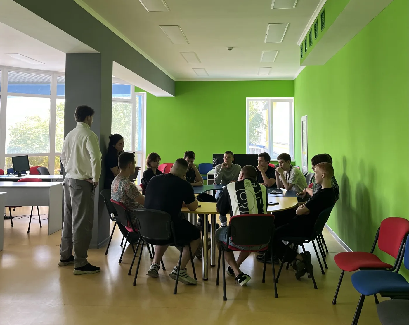 Students working together around the tables at the kood/Zhytomyr campus