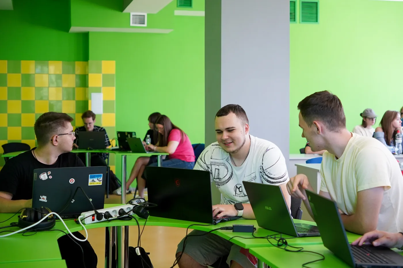 kood/Zhytomyr students working on laptops at the campus